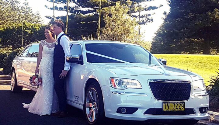 Congratulations to our bride & groom on their wedding day. Pictured with our Chrysler 300C Super Stretch Limousine