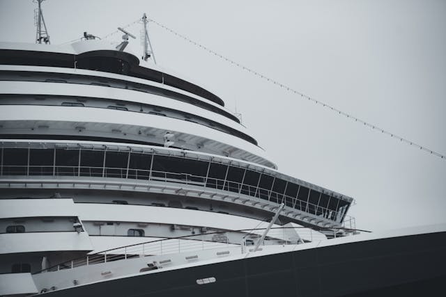 Black & white image of a huge cruise ship.
