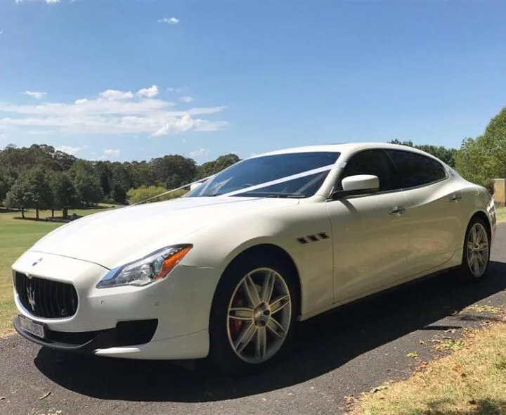 Stunning shot of our Maserati Quattroporte sedan. This Maserati Quattroporte twin-turbo V6 executive 4 passenger sedan is a masterpiece of sophistication, aesthetics and elegance. Exquisite Italian black silk interior, top class materials combine to generate an absolute masterpiece of taste and refinement.