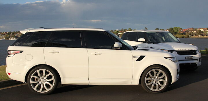 Multiple luxury vehicles prepared for school formal transport