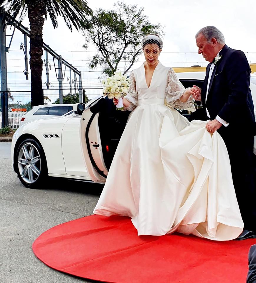 The red carpet service for our bride Ilana and her father as she exists her wedding transport.